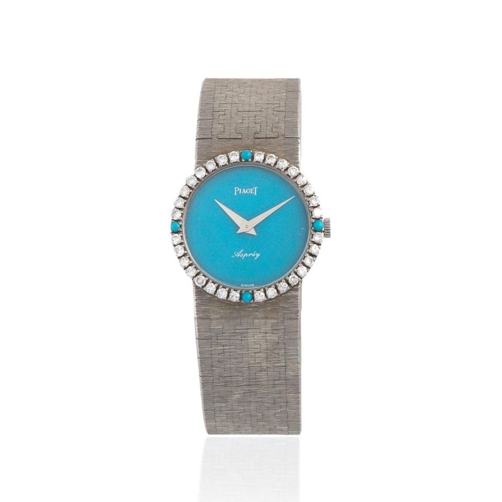 Piaget. A lady's 18K white gold and diamond set bracelet watch with turquoise hardstone dial Retailed by Asprey