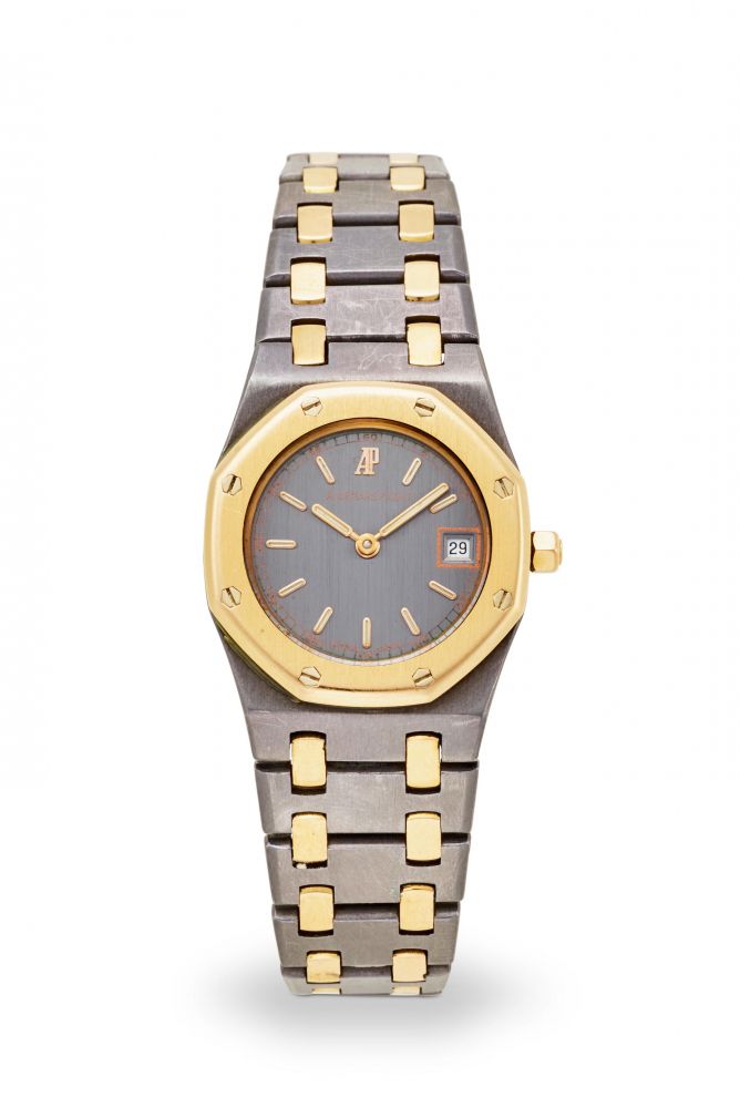 AUDEMARS PIGUET. A LADY'S 18K ROSE GOLD AND TANTALUM CALENDAR BRACELET WATCH