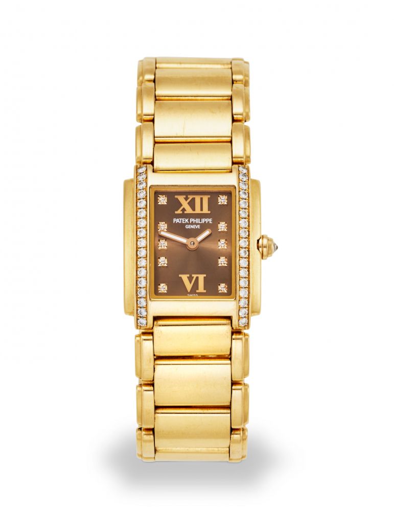 PATEK PHILIPPE. A LADY'S 18K ROSE GOLD BRACELET WATCH