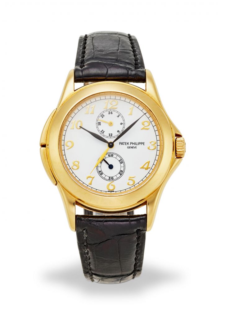 PATEK PHILIPPE. A FINE 18K YELLOW GOLD MANUAL WIND DUAL TIME WRISTWATCH