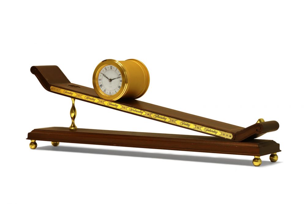 Imhof | A Rare Gilt Brass Incline Plane Clock, Circa 1970