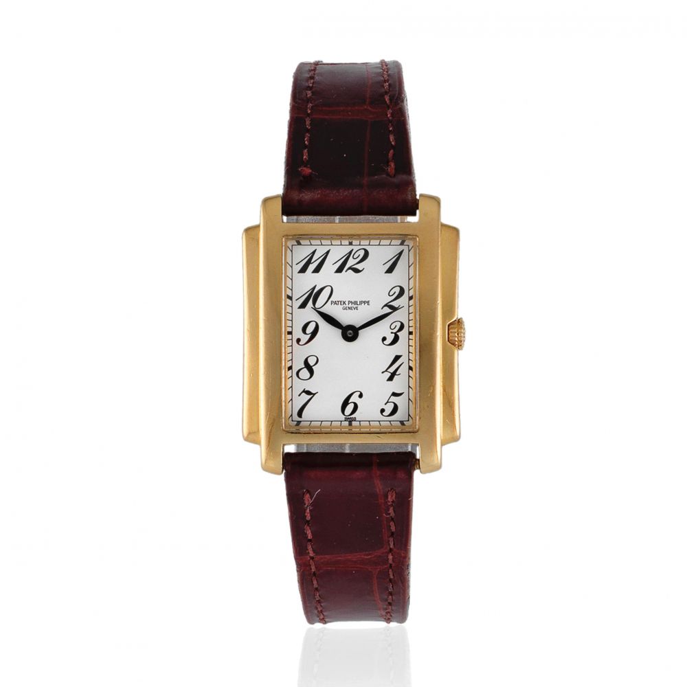 Patek Philippe. A lady's 18K gold quartz rectangular wristwatch