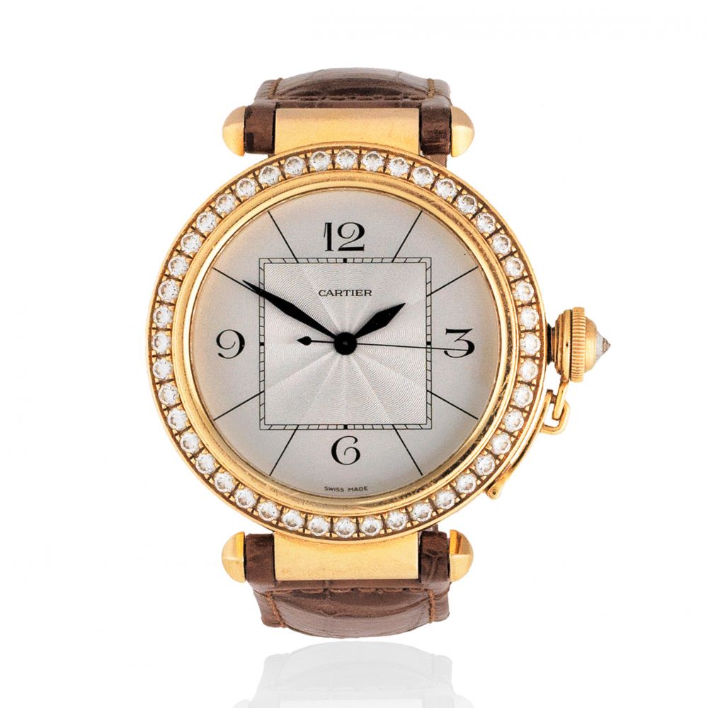 Cartier. An 18K gold and diamond set automatic wristwatch