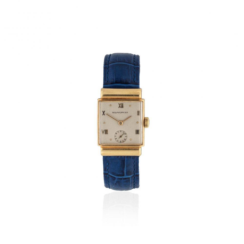 Patek Philippe. An 18K gold manual wind rectangular wristwatch