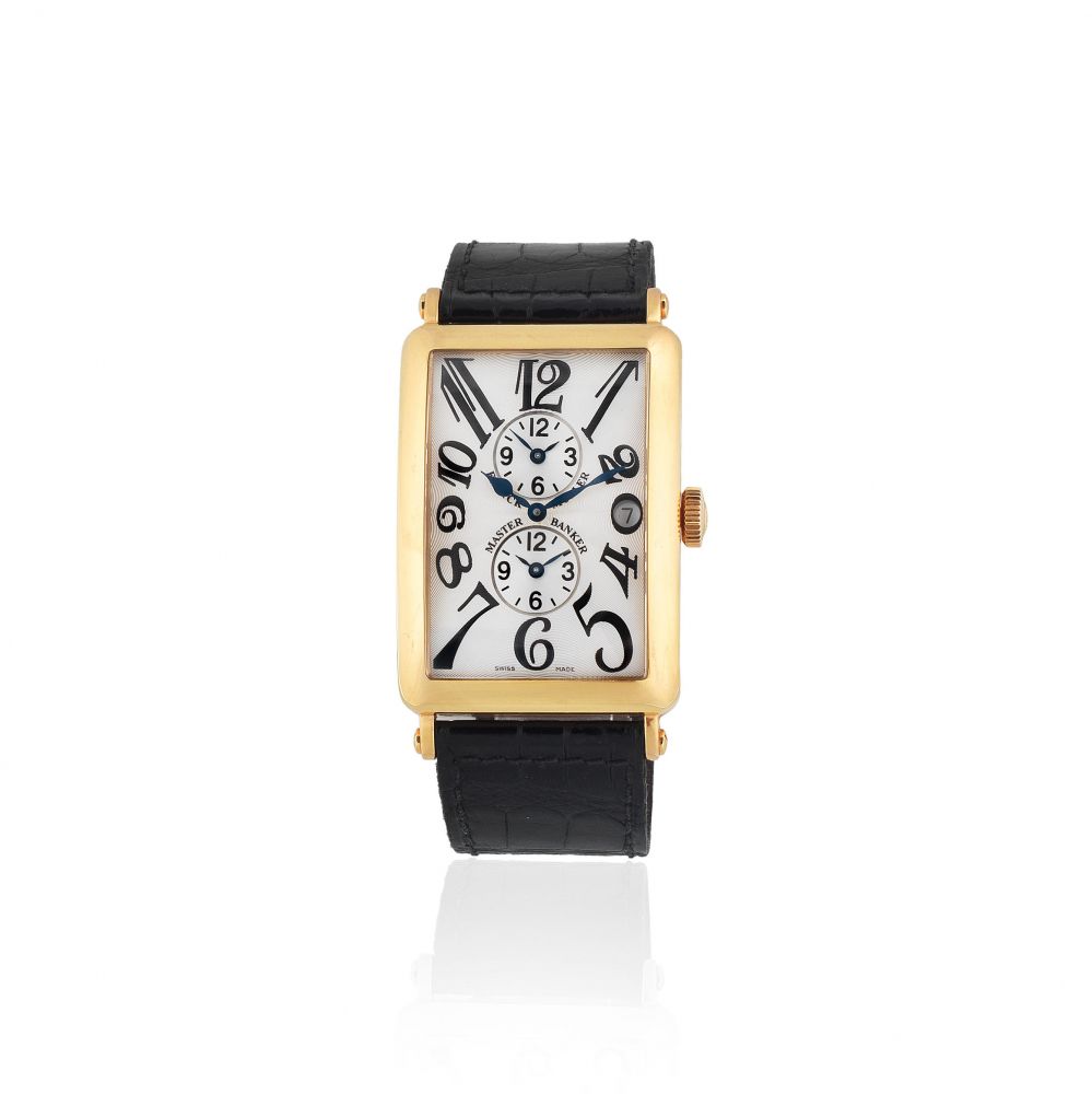 Franck Muller. An 18K gold automatic calendar wristwatch with triple time zone