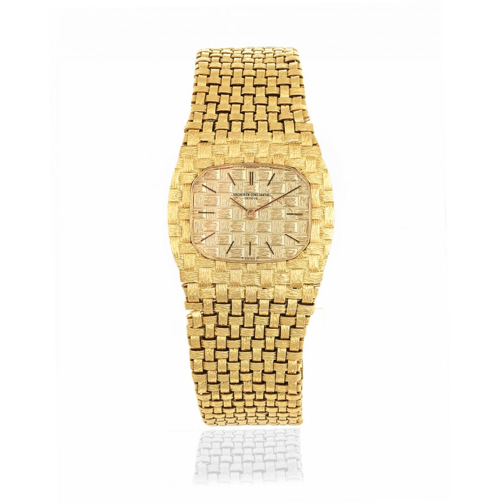 Vacheron Constantin. An 18K gold manual wind textured bracelet watch
