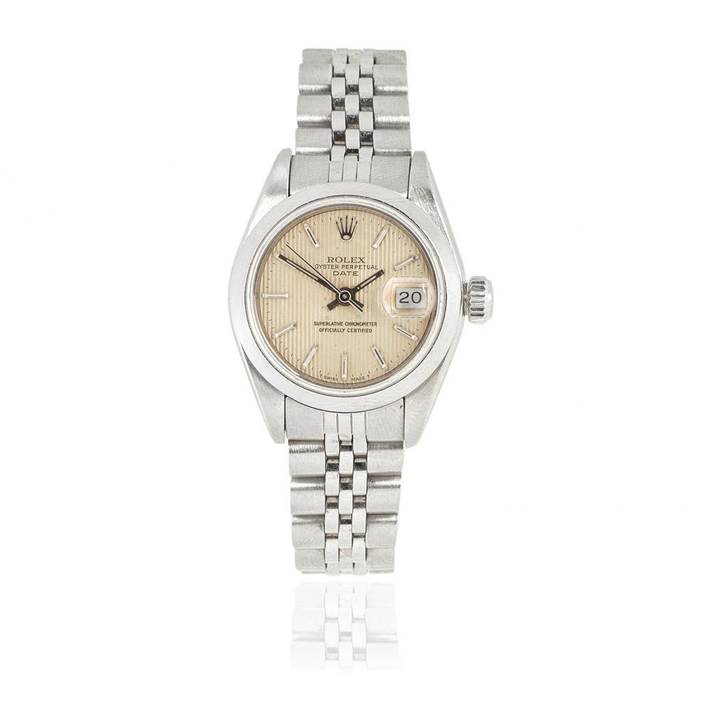 Rolex. A lady's stainless steel automatic calendar bracelet watch