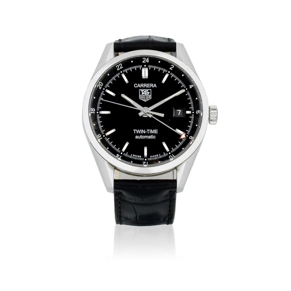 TAG Heuer. A stainless steel automatic calendar wristwatch with dual time zone