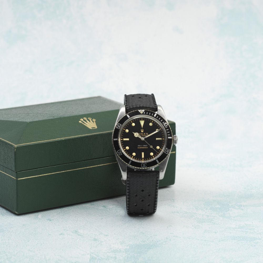 Rolex. A fine stainless steel automatic wristwatch with gilt dial