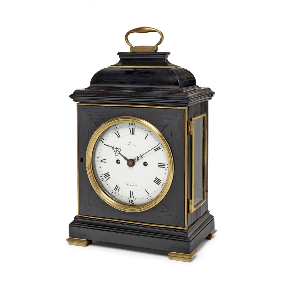 A BRASS MOUNTED EBONIZED STRIKING TABLE CLOCK