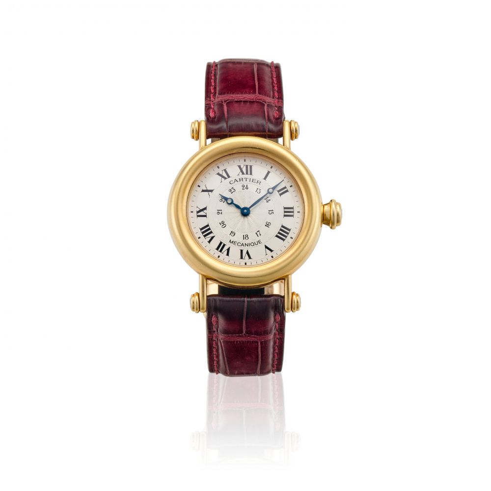 CARTIER. AN 18K GOLD AND DIAMOND MANUAL WIND WRISTWATCH