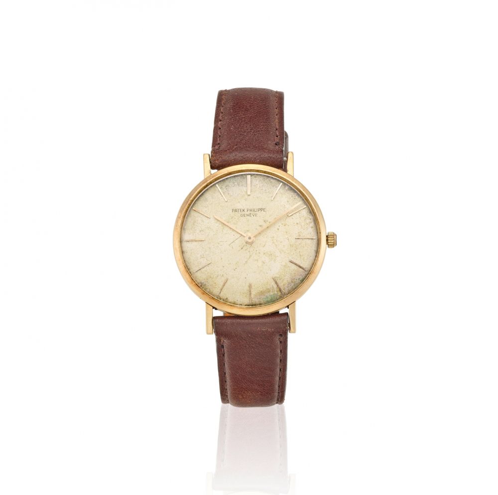 PATEK PHILIPPE. AN 18K GOLD MANUAL WIND WRISTWATCH