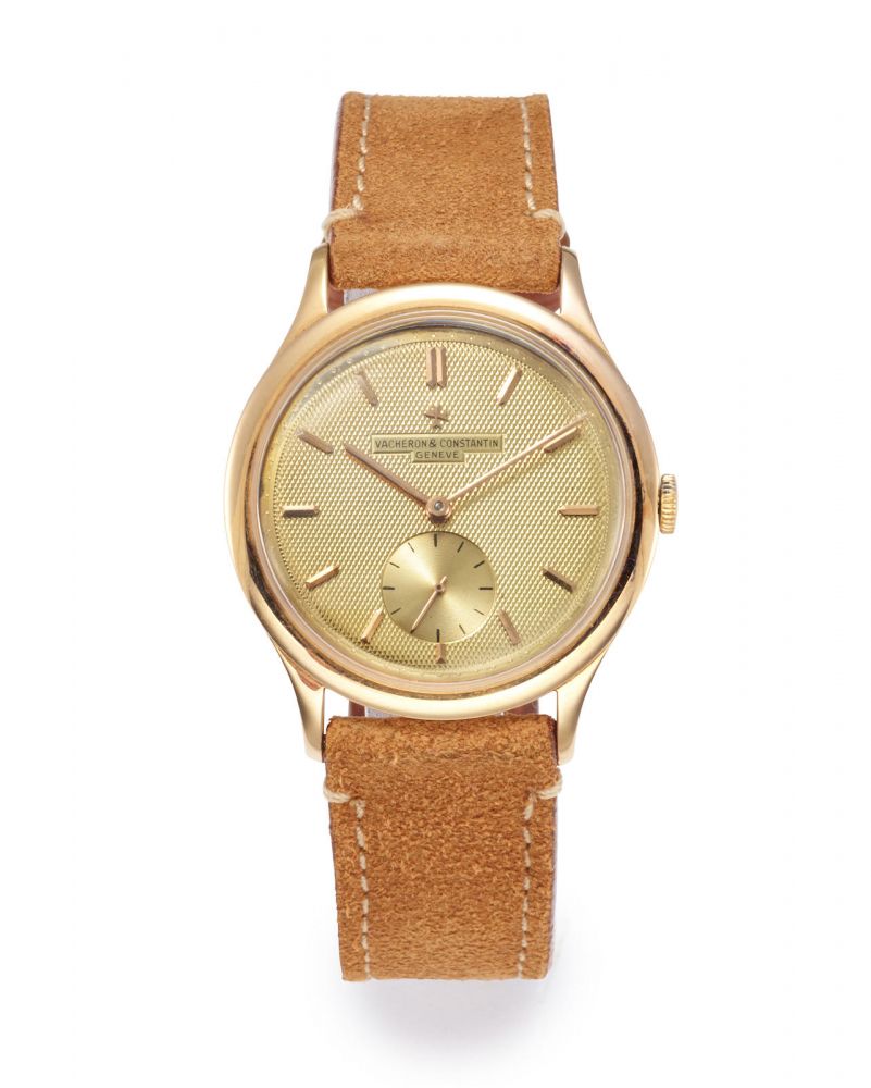 VACHERON & CONSTANTIN. A RARE OVERSIZED PINK GOLD WRISTWATCH WITH CHAMPAGNE GILT TEXTURED DIAL, CIRCA 1955