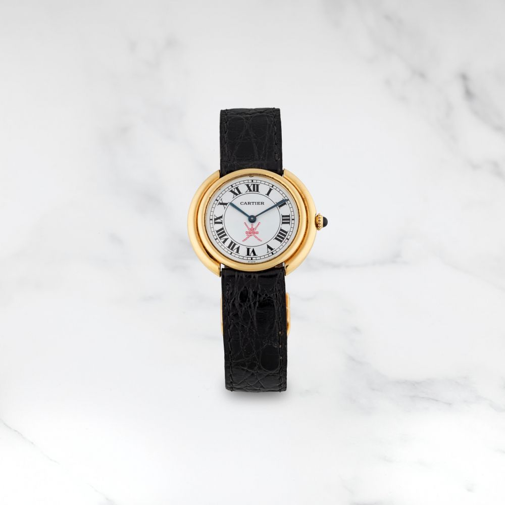 CARTIER. MONTRE BRACELET EN OR JAUNE 18 CARATS CADRAN KHANJAR MOUVEMENT MECANIQUE