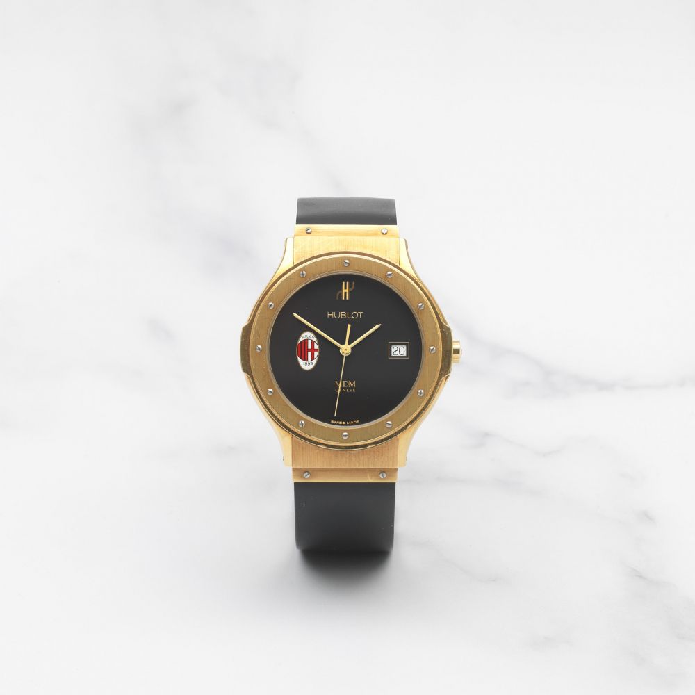 HUBLOT. MONTRE BRACELET EN OR JAUNE 18 CARATS MOUVEMENT QUARTZ AVEC L'ECUSSON DU MILAN AC OFFERT PAR ALESSANDRO 'BILLY' COSTACURTA