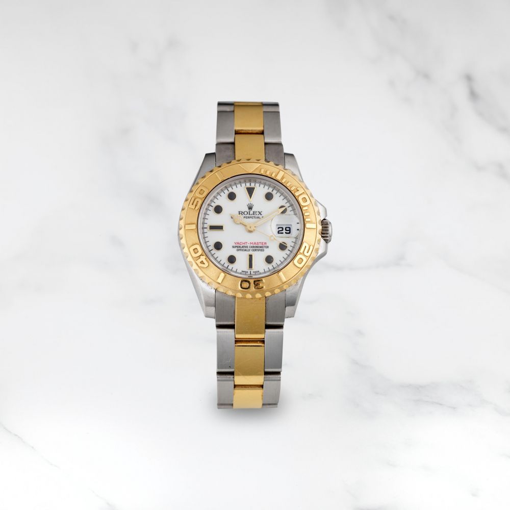 ROLEX. MONTRE BRACELET EN OR JAUNE 18K (750) ET ACIER AVEC DATE MOUVEMENT AUTOMATIQUE