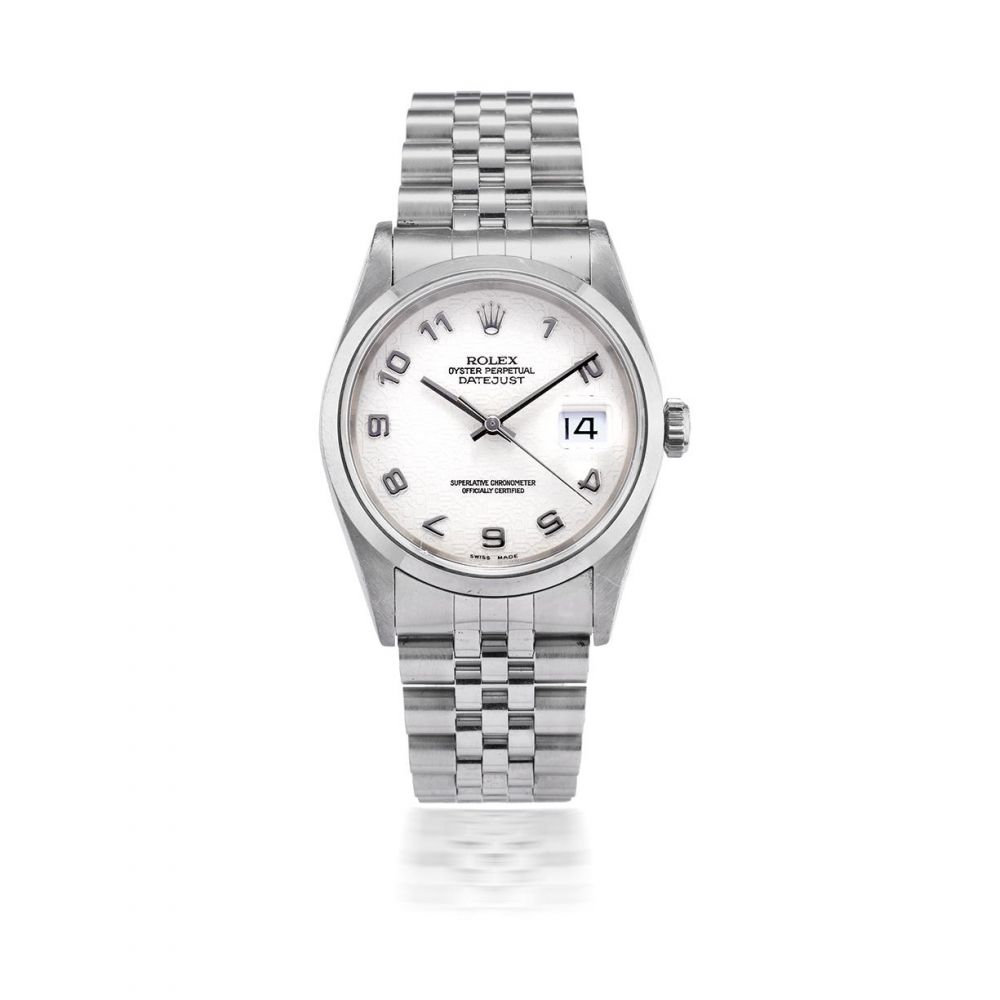 ROLEX. MONTRE BRACELET EN ACIER AVEC DATE MOUVEMENT AUTOMATIQUE