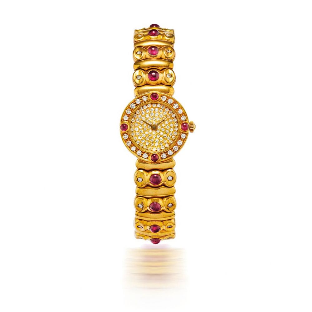 MONTRE BRACELET MANCHETTE EN OR ROSE 18K (750) SERTIE DE DIAMANTS ET DE RUBIS MOUVEMENT QUARTZ