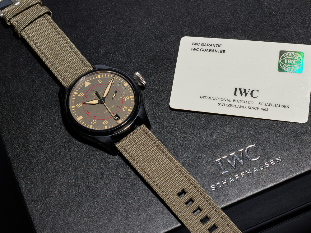 IWC | PILOTS - TOP GUN MIRAMAR, A NEW OLD STOCK BLACK CERAMIC WRISTWATCH WITH DATE AND 7-DAYS POWER RESERVE DISPLAY, CIRCA 2015