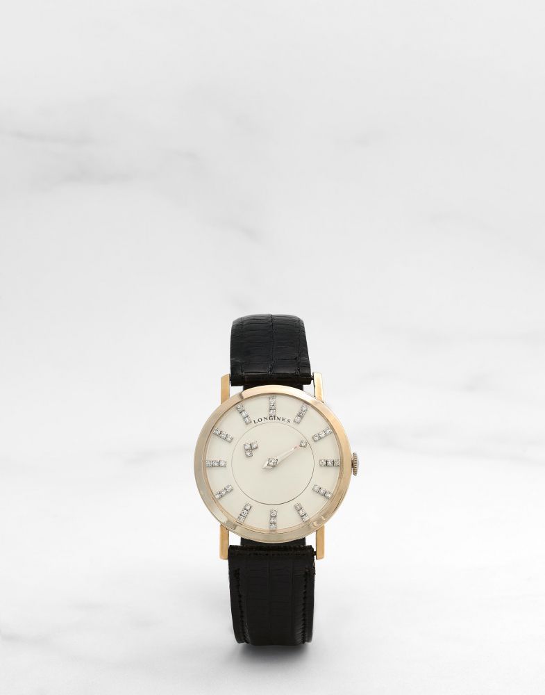 LONGINES. MONTRE BRACELET EN OR JAUNE 14K (585) A CADRAN MYSTERE ET DIAMANTS MOUVEMENT MECANIQUE