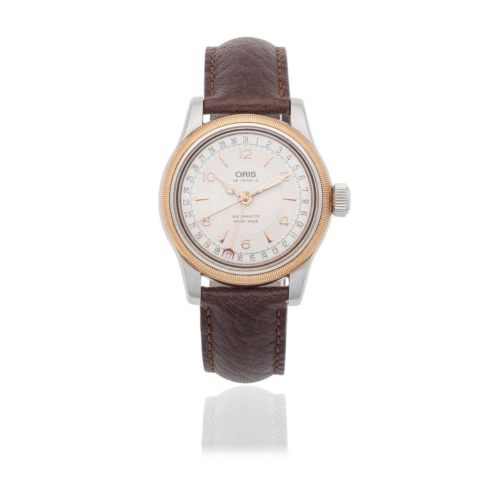 Oris. A stainless steel and gold automatic calendar wristwatch