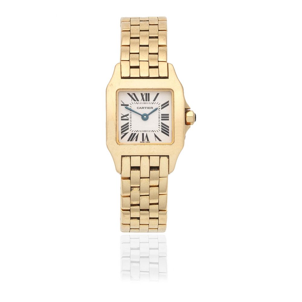 Cartier. A lady's 18K gold quartz bracelet watch