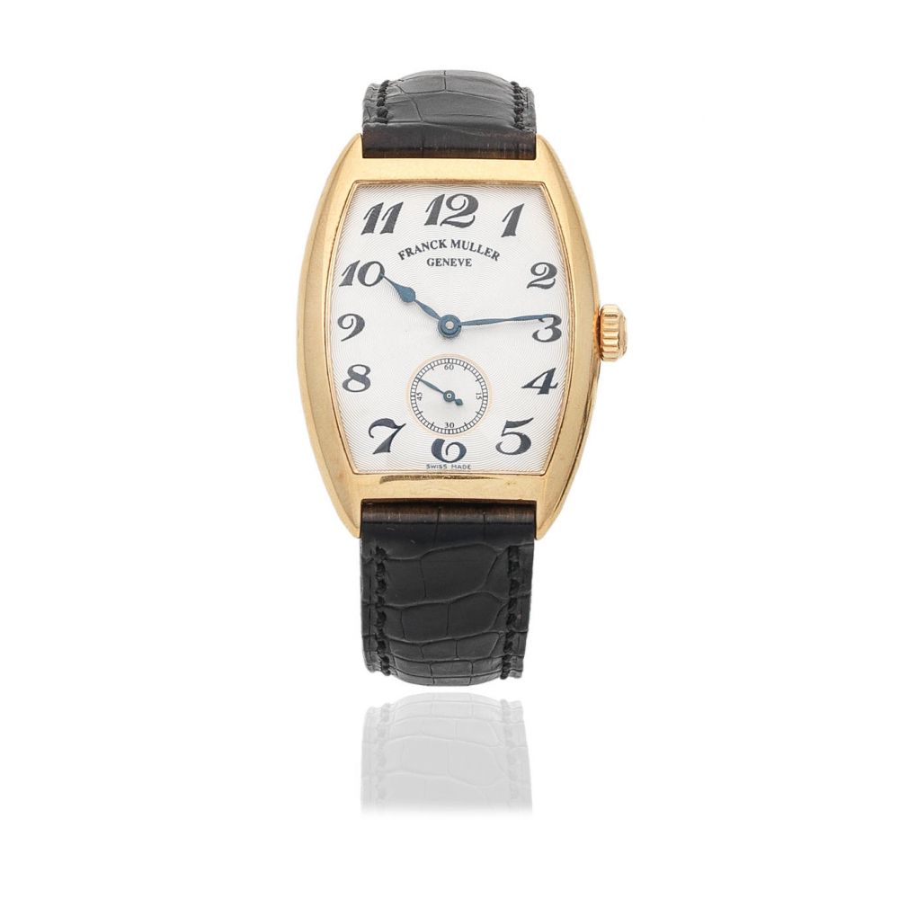 Franck Muller. An 18K gold manual wind tonneau form wristwatch