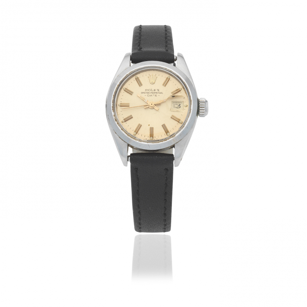 Rolex. A lady's stainless steel automatic calendar wristwatch