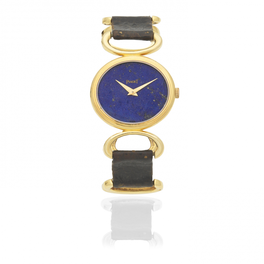 Piaget. A lady's 18K gold manual wind wristwatch with lapis lazuli dial