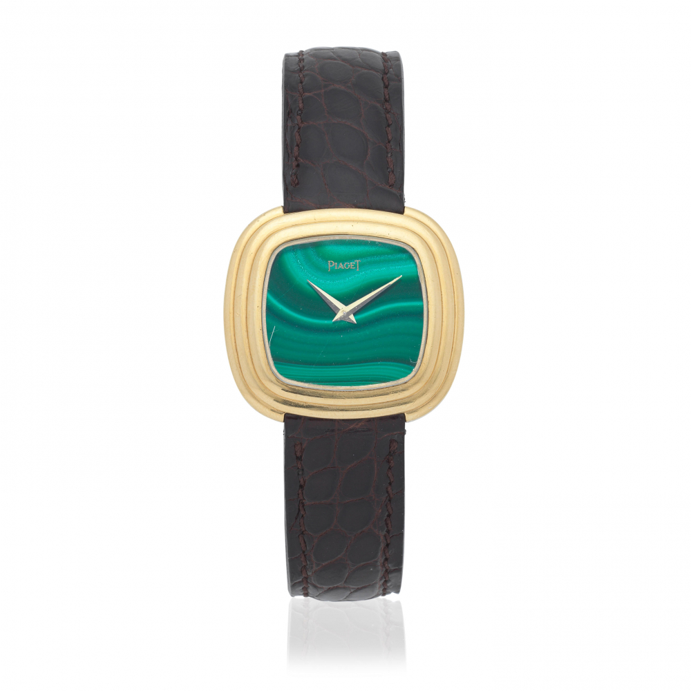 Piaget. An 18K gold quartz cushion form wristwatch with malachite dial