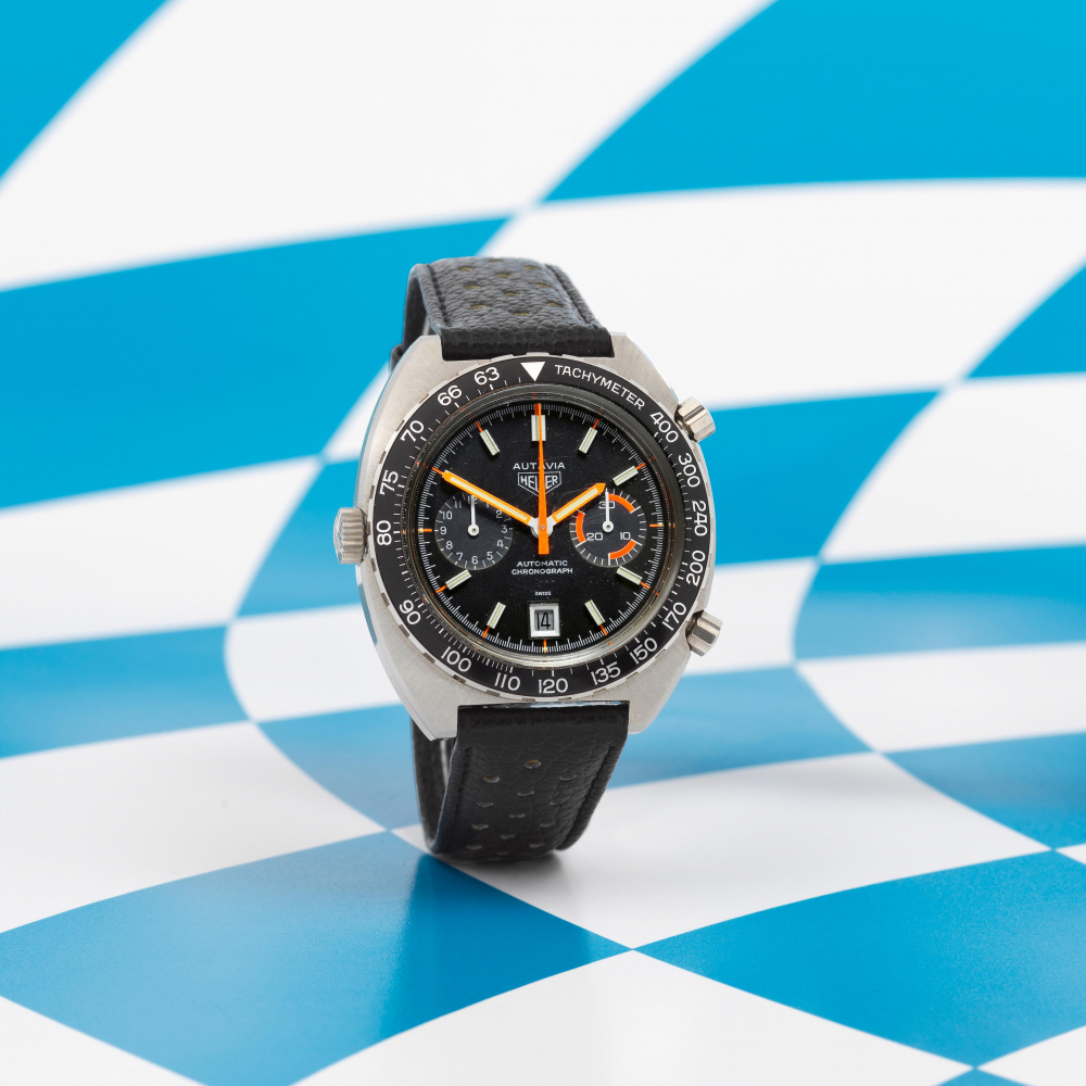 Heuer. A rare stainless steel automatic calendar chronograph wristwatch