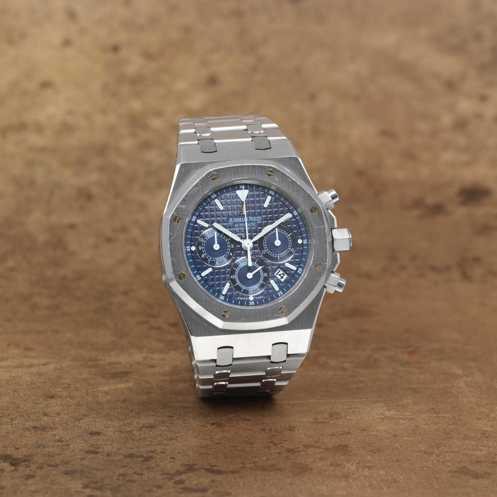 Audemars Piguet. A stainless steel automatic calendar chronograph bracelet watch