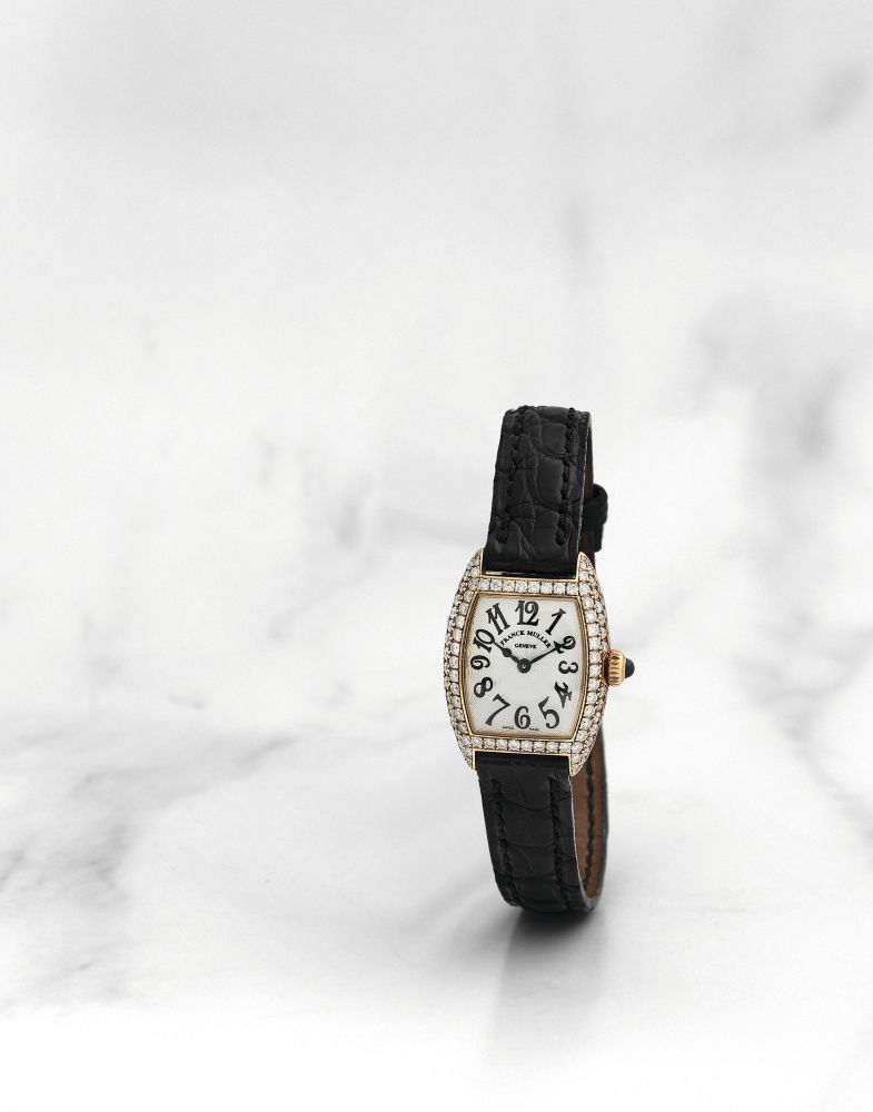 Franck Muller. Montre bracelet de dame en or jaune 18 K (750) sertie de diamants mouvement quartz