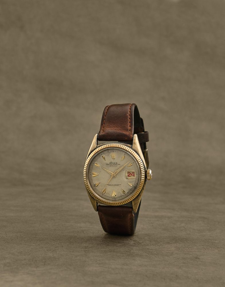 Rolex. Montre bracelet en or jaune 9K (375) avec dateur roulette mouvement automatique