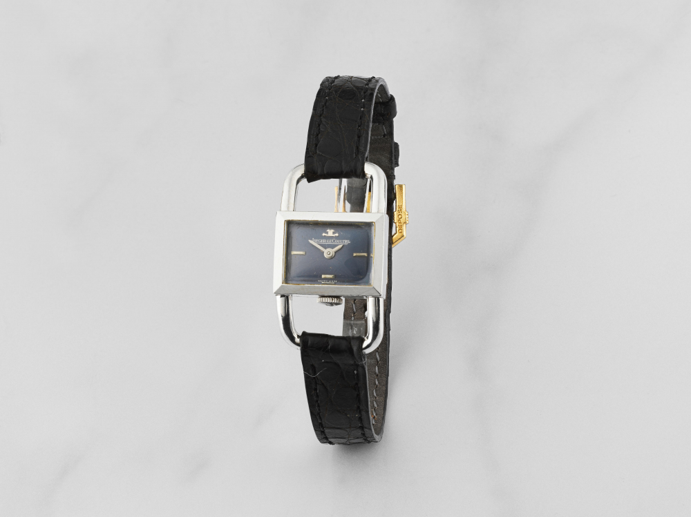 Jaeger-LeCoultre. Montre bracelet de dame en acier de forme rectangulaire et anses en étrier mouvement mécanique