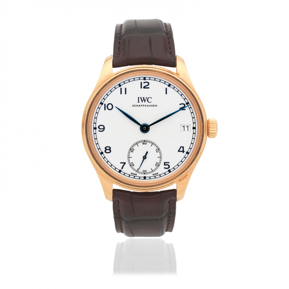 IWC. A Limited Edition 18K rose gold manual wind calendar wristwatch