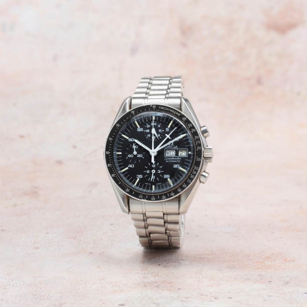 Omega. A rare stainless steel automatic calendar chronograph bracelet watch