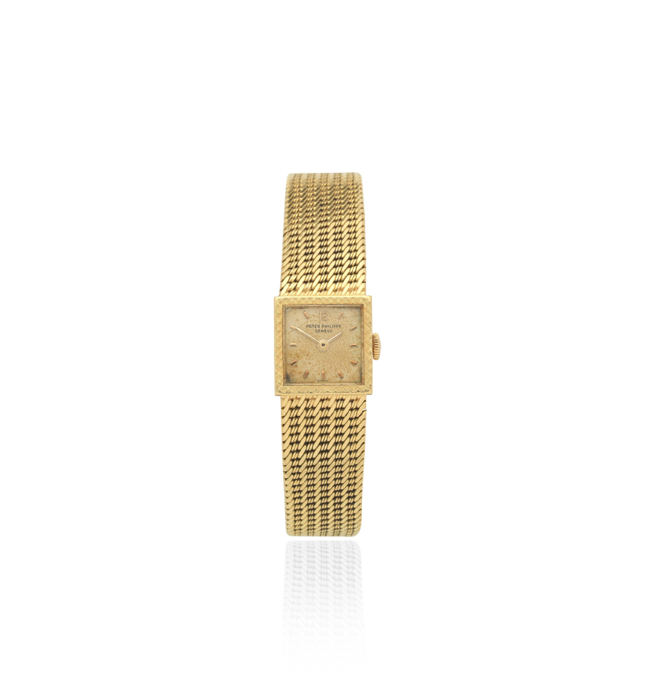 Patek Philippe. A lady's 18K gold manual wind bracelet watch