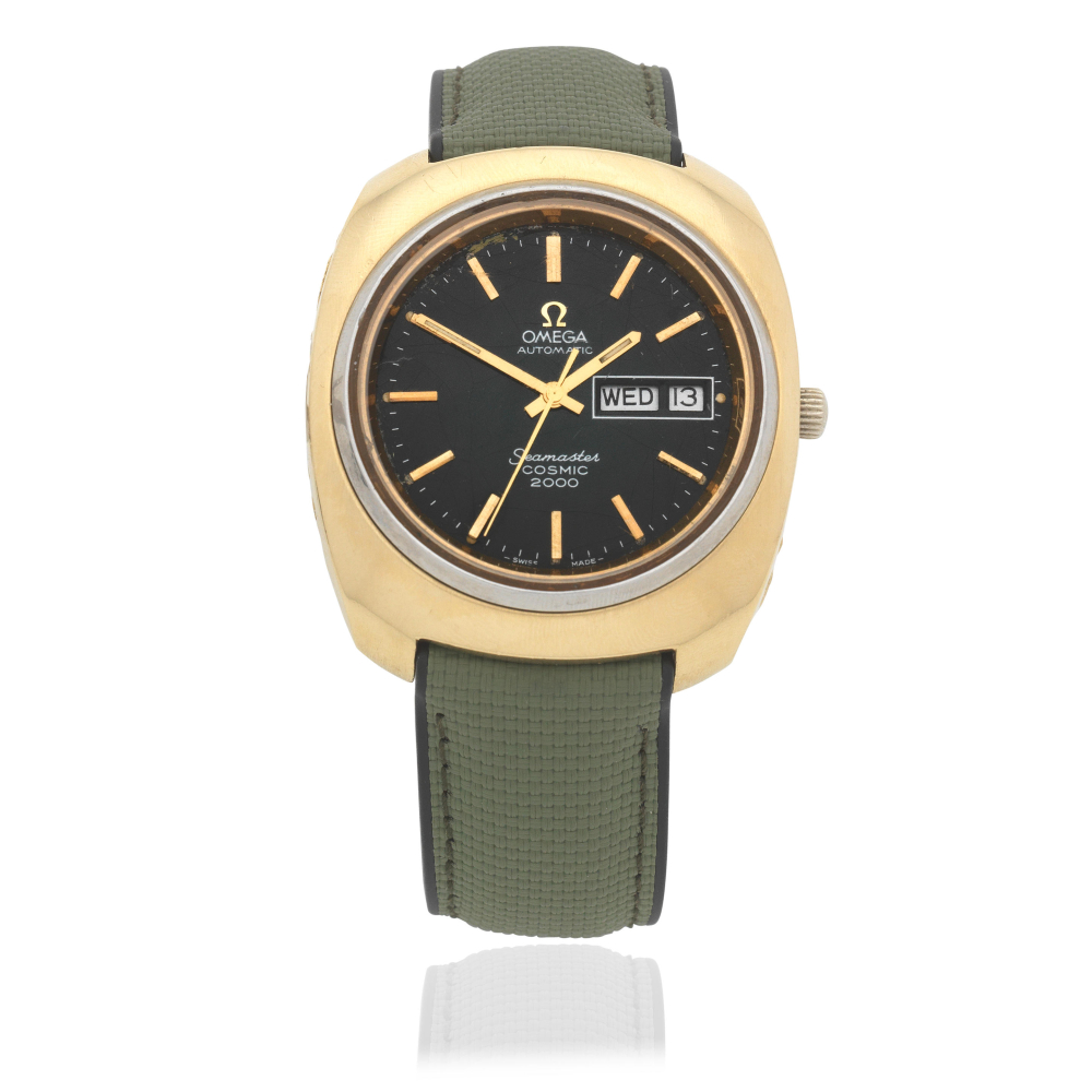 Omega. An stainless steel gold plated automatic calendar wristwatch with green spider dial