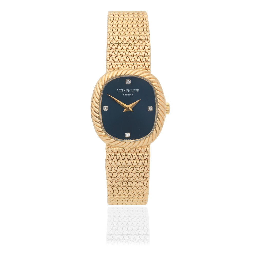 Patek Philippe. A lady's 18K gold diamond set manual wind bracelet watch with sigma dial