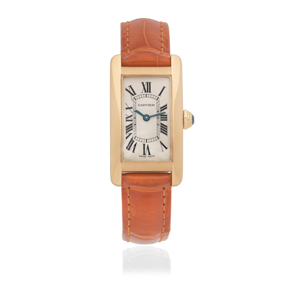 Cartier. A lady's 18K gold rectangular quartz wristwatch