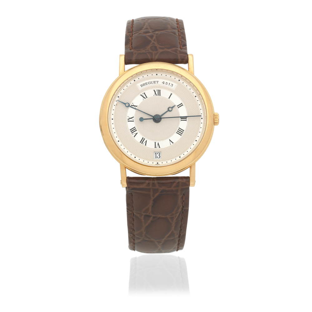 Breguet. An 18K gold automatic calendar wristwatch