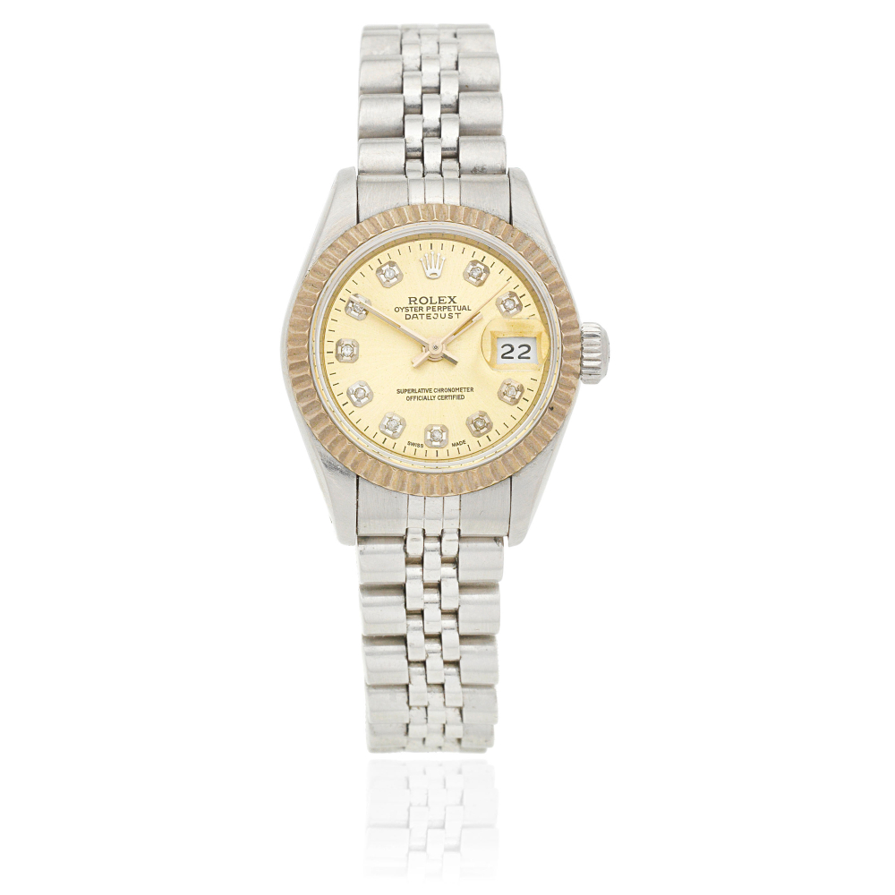 Rolex. A lady's stainless steel and 18K white gold diamond set automatic calendar bracelet watch