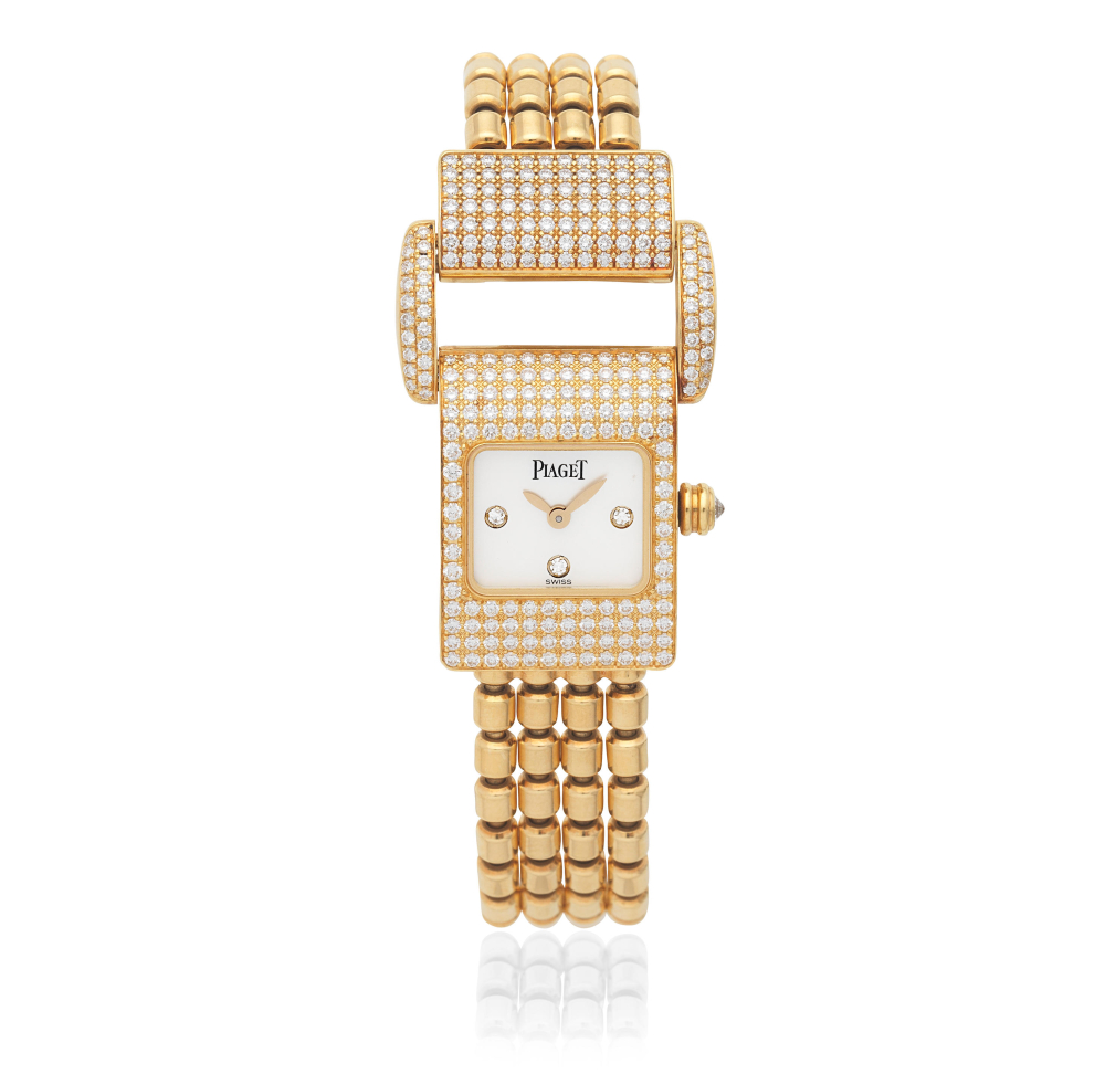Piaget. A lady's 18K gold diamond set quartz bracelet watch with mother of pearl dial