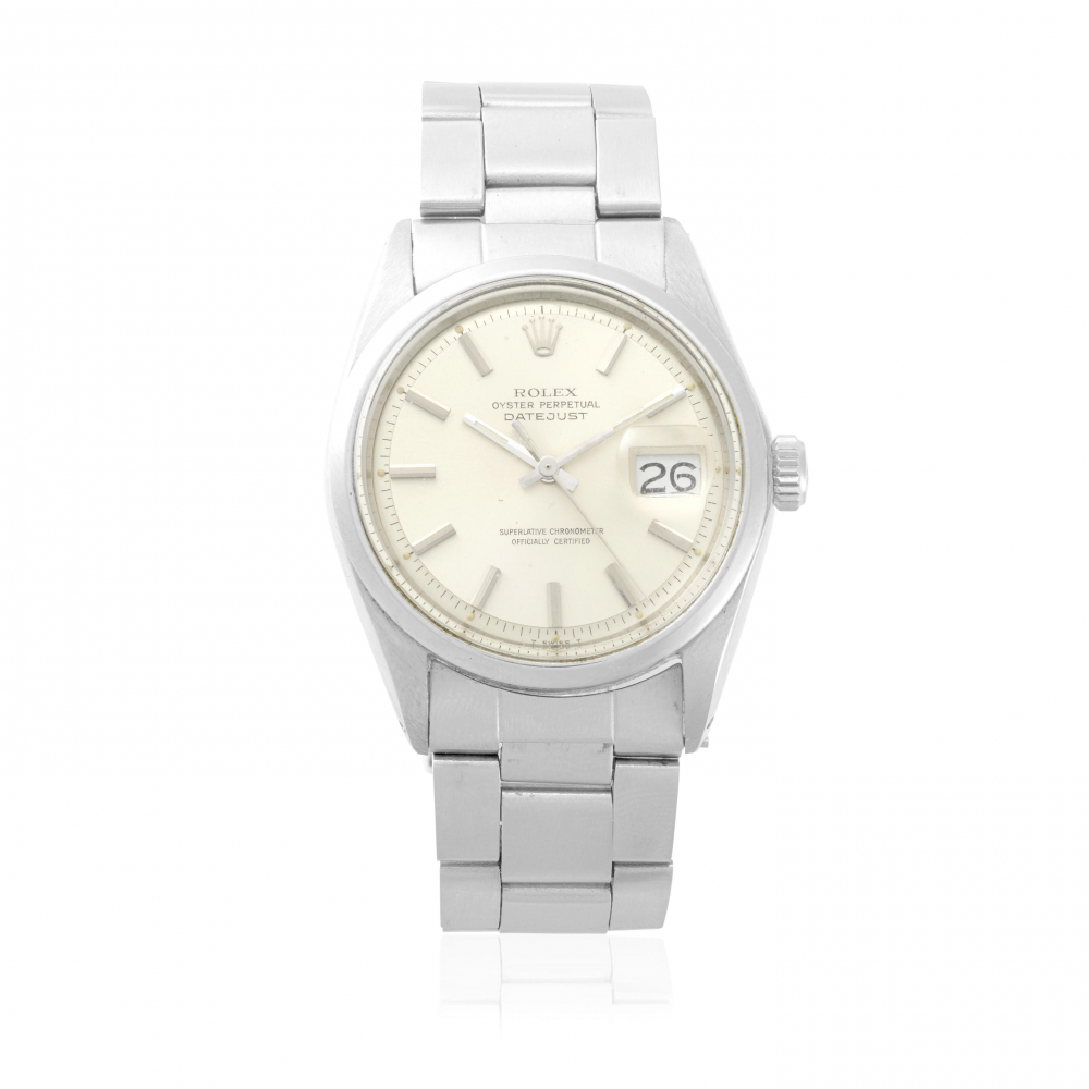 ROLEX. A STAINLESS STEEL AUTOMATIC CALENDAR BRACELET WATCH