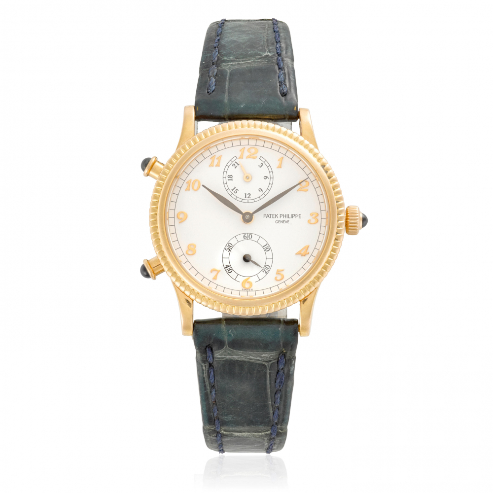 PATEK PHILIPPE. A LADY'S 18K GOLD DUAL TIME ZONE MANUAL WIND WRISTWATCH WITH 24 HOUR INDICATION