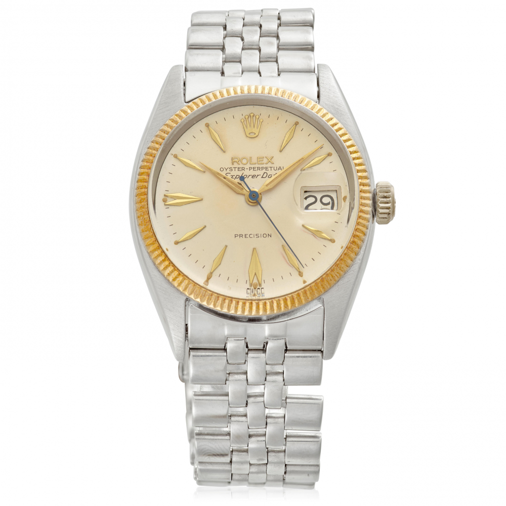 ROLEX. A RARE STEEL AND GOLD AUTOMATIC CALENDAR WRISTWATCH