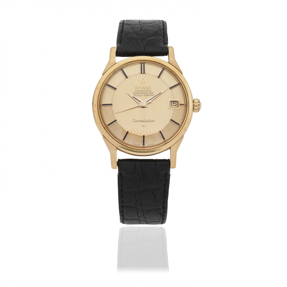 Omega. An 18K gold automatic calendar wristwatch with pie-pan dial