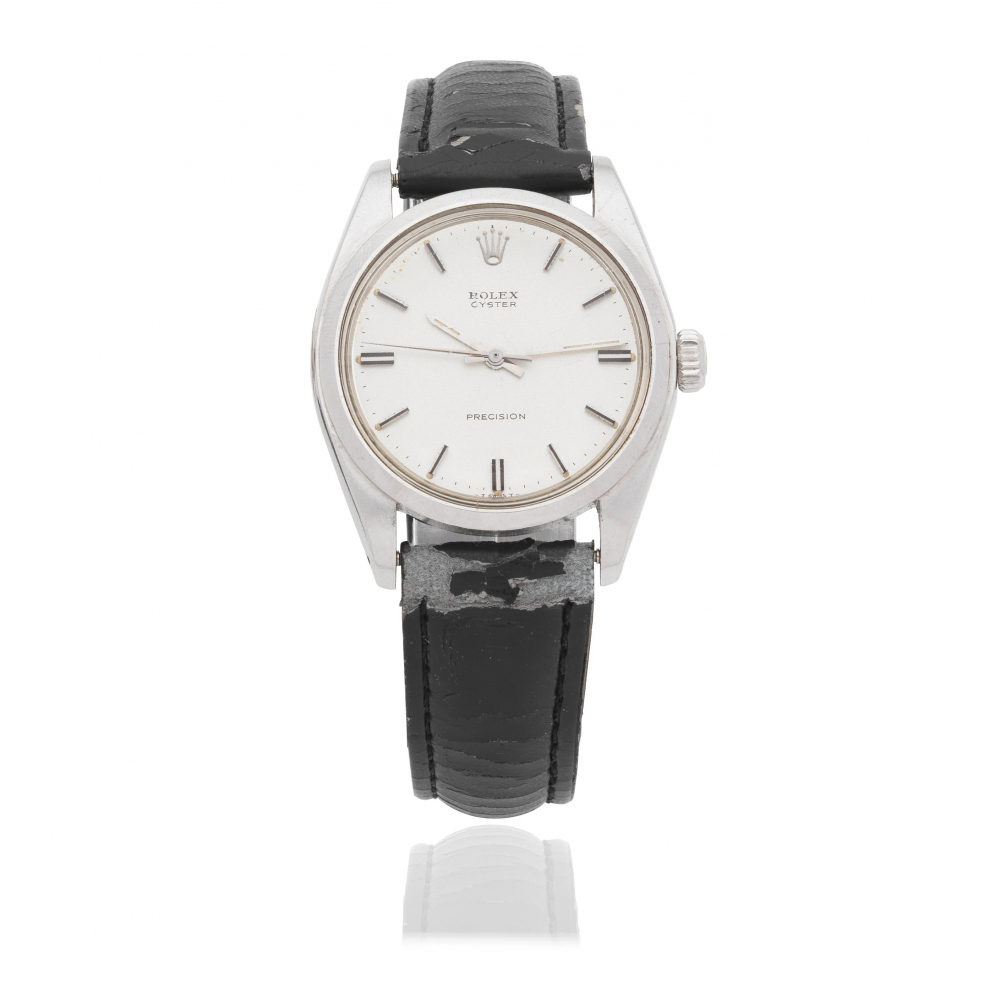 Rolex. A stainless steel manual wind wristwatch