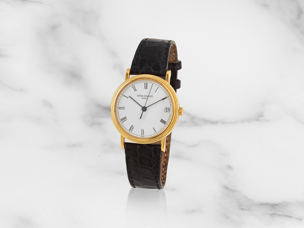 Patek Philippe. Montre bracelet en or jaune 18K (750) avec date mouvement automatique
